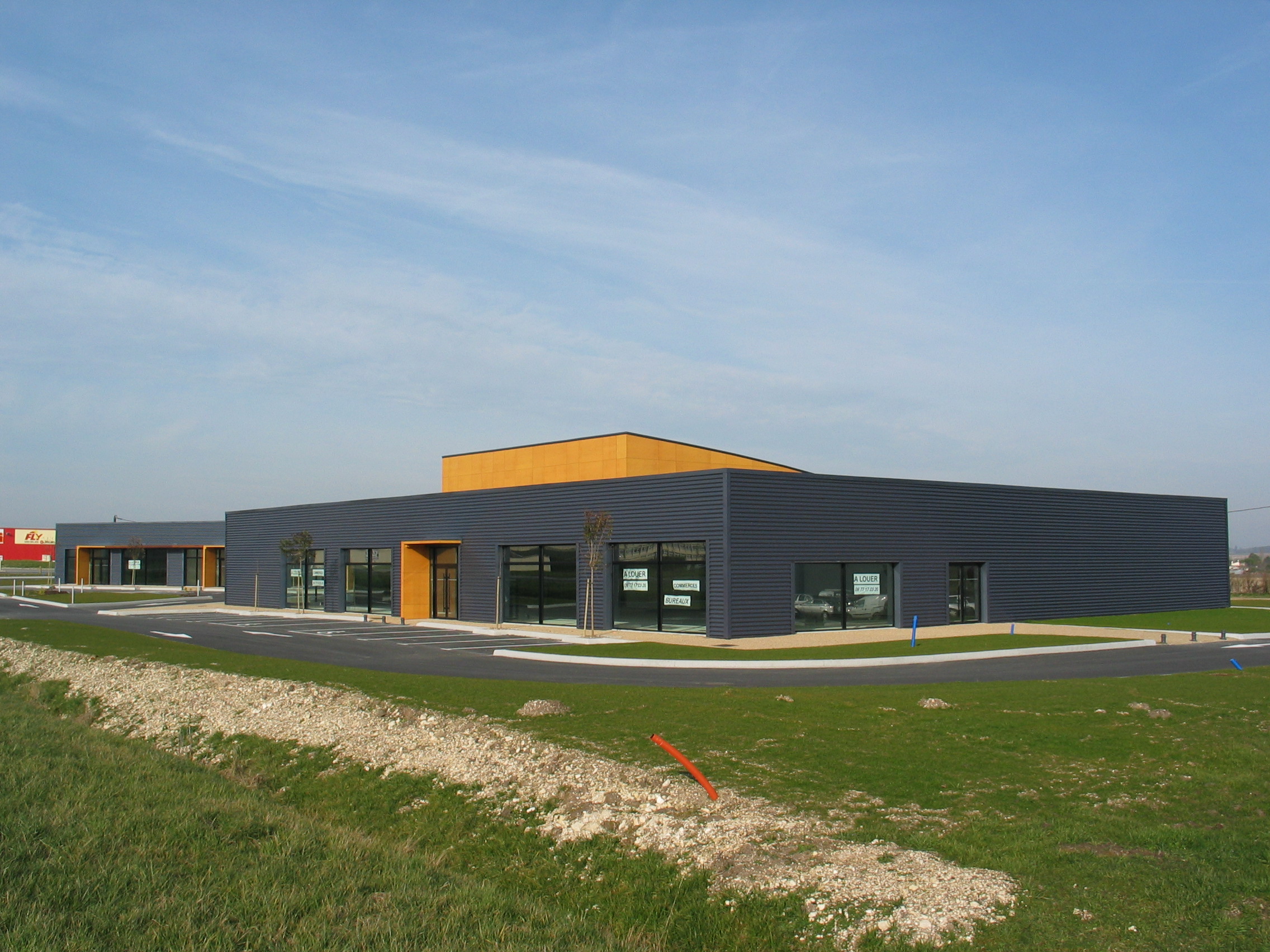 CONSTRUCTION D’UN BÂTIMENT COMMERCIAL LES GONDS