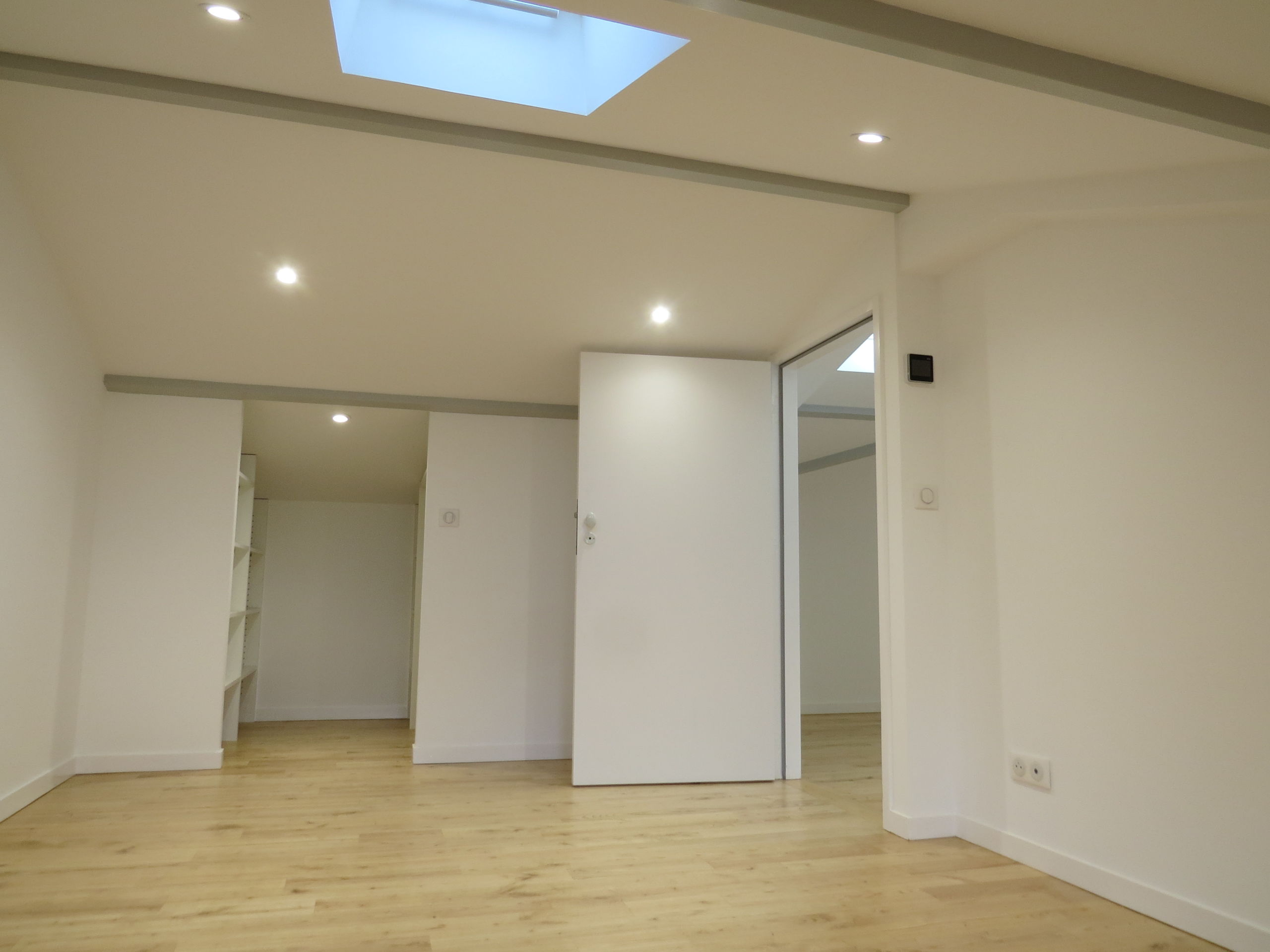 AMÉNAGEMENT DES COMBLES D’UNE MAISON DE VILLE